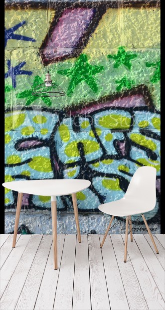 Picture of Fragment of graffiti drawings The old wall decorated with paint stains in the style of street art culture Colored background texture in green tones